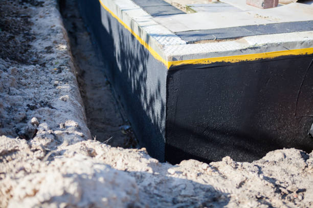 Professional Waterproofing technician working in Spring Lake, NC